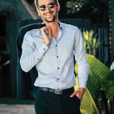 Portrait of a man in a brown coat